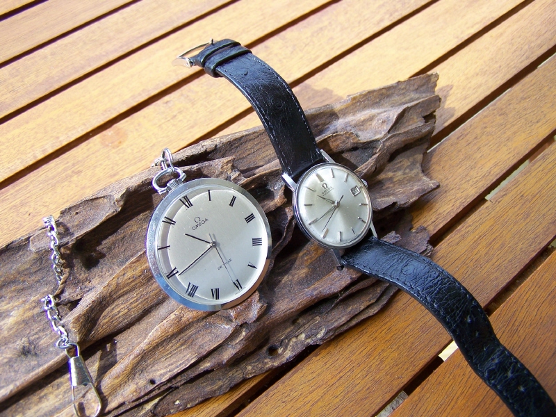 Un couple d'OMEGA vintage 090620044243486943910392